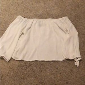 white cropped off the shoulder shirt